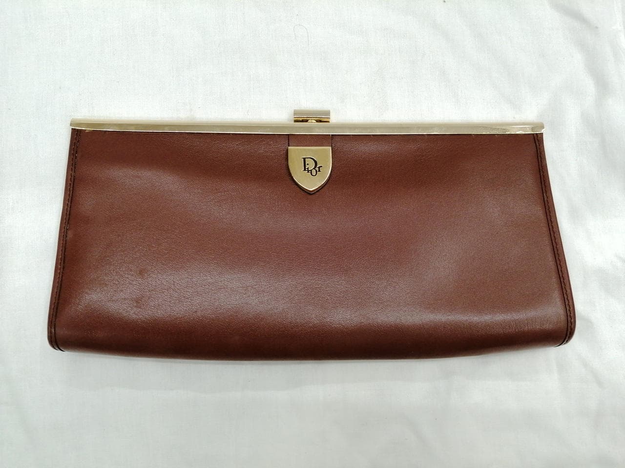 Brown clutch bag