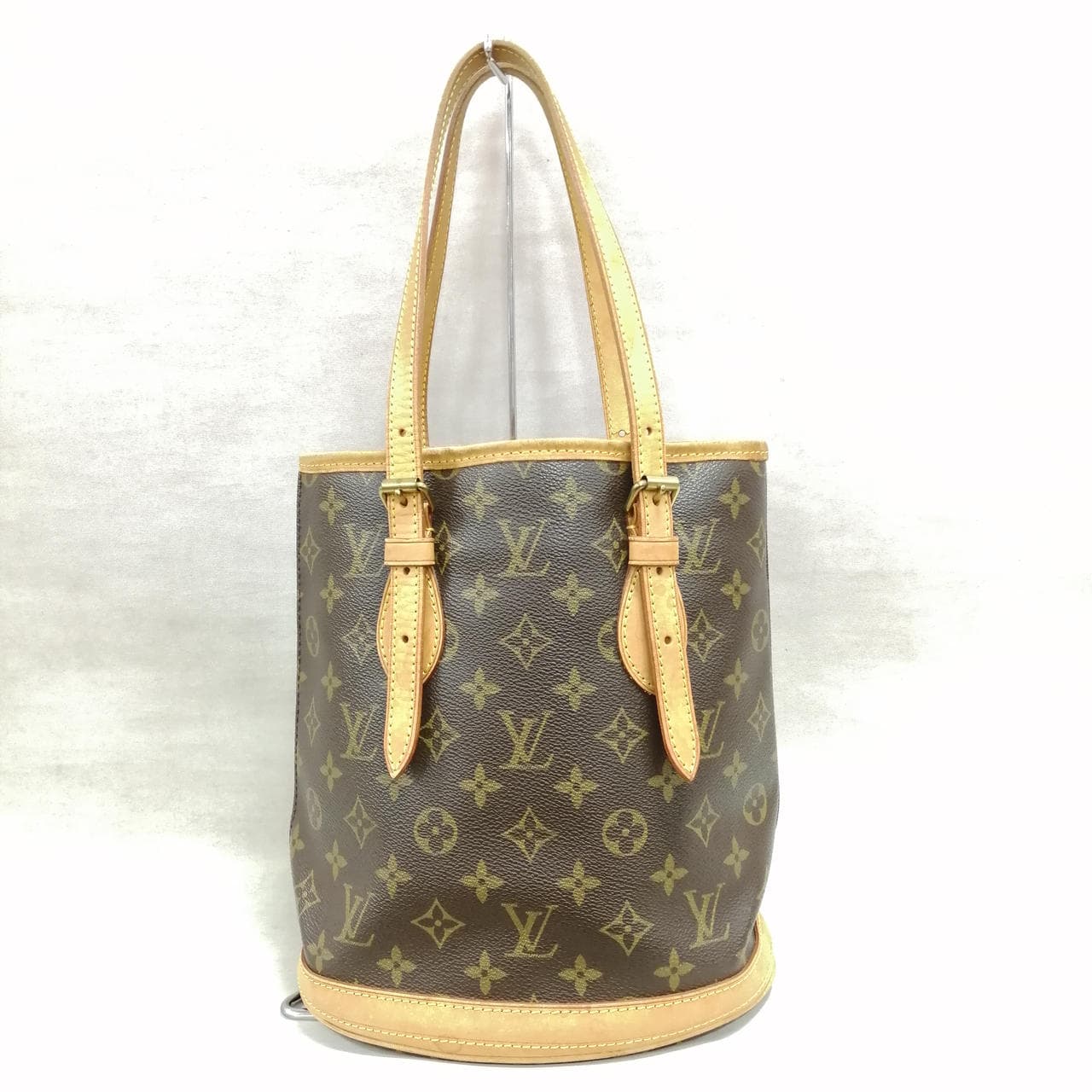 Monogram Bucket PM M42238 with stains